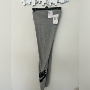 Nike Gray Leggings with Tapered Design and Bold Logo